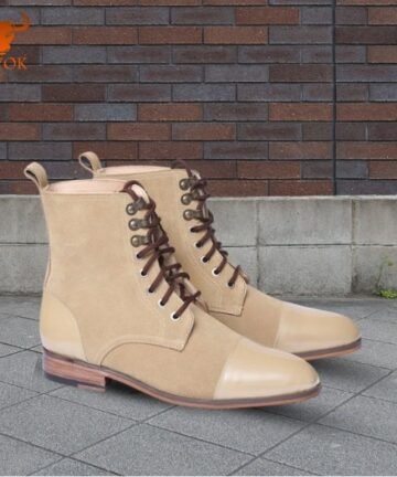 Classic beige cap toe lace up Oxford boots for men on urban background