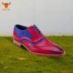 Stylish two-tone wingtip brogues available globally.