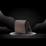 Stylish and durable laptop bag from Bwok Store displayed on a dark background.