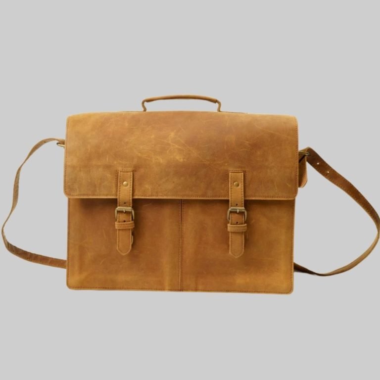 Women’s leather briefcase with shoulder strap and laptop compartment