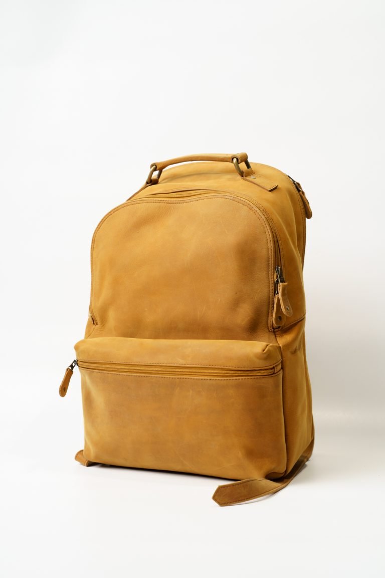 Vintage canvas backpack with leather straps and spacious compartments