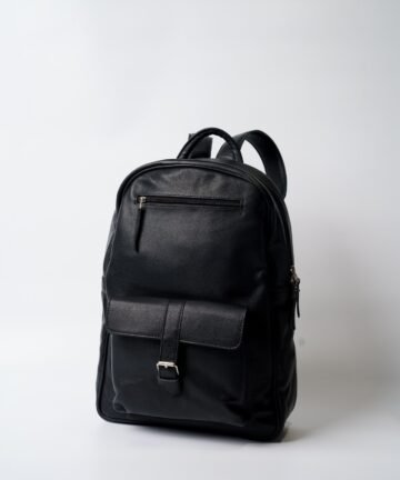 Black travel backpack with USB port and laptop compartment