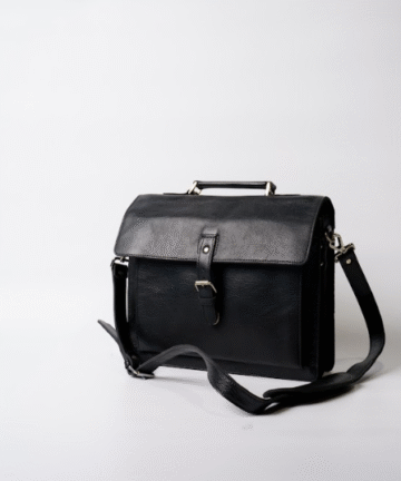 Premium black leather office bag on desk