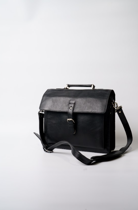 Premium black leather office bag on desk