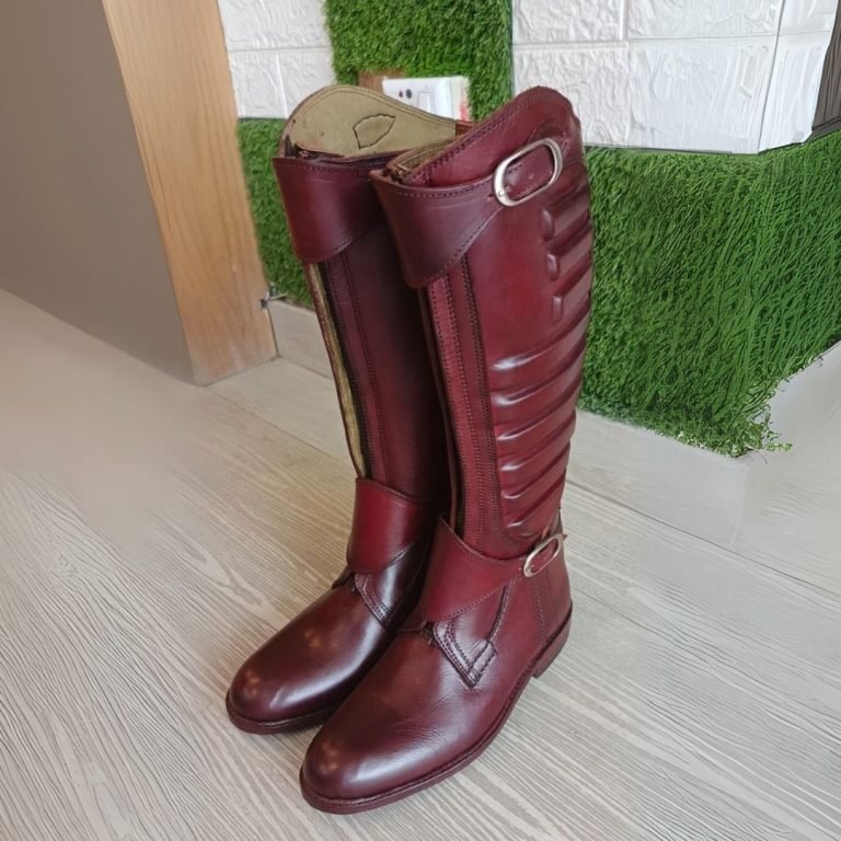 Pair of burgundy leather horse riding boots.