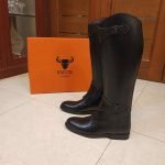 Elegant black leather premium tall boots.