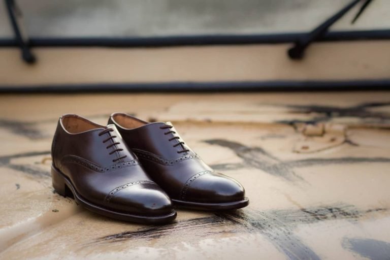 Elegant Toronto Leather Shoes in a rich brown hue.