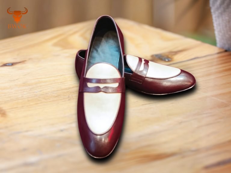 Maroon men’s loafers shoes on wooden surface with soft inner lining